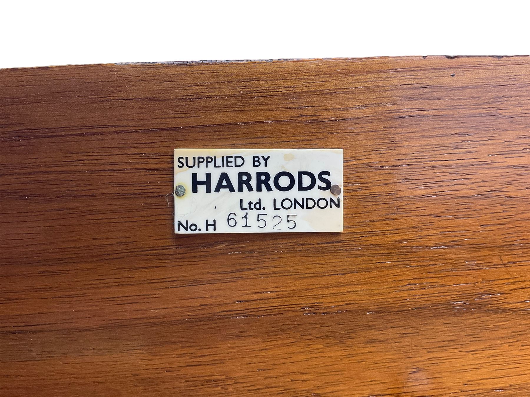  Antonin Petrof - Walnut overstrung baby grand piano, 7 0catve 85 key compass with original strings, tuning pins, damper felts and hammer heads, with roller keyboard action and iron frame, sustaining and una-corda pedals, sliding open lattice music desk, supported on square tapering legs with brass cups and castors, with inner ebonised key fall and ivorine label inscribed 'Supplied by Harrods, London'.