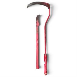 Assorted garden and architectural salvage, comprising a galvanised watering can, two long-handled cutting tools, metal pole, pair of ornate cast iron supports and further decorative fragments