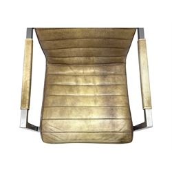 Pair of contemporary industrial style armchairs, each featuring a squared steel cantilever frame with upholstered arms, the seat and back finished in channel-stitched distressed tan faux leather