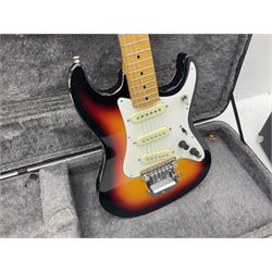 Fender style sunburst electric guitar with manuscript mark 'Zenta Stratocaster 1963' L97cm; in hard carrying case; another similar unmarked sunburst electric guitar; in gig bag; and Fender Frontman Amplifier, serial no.M473406 (3)