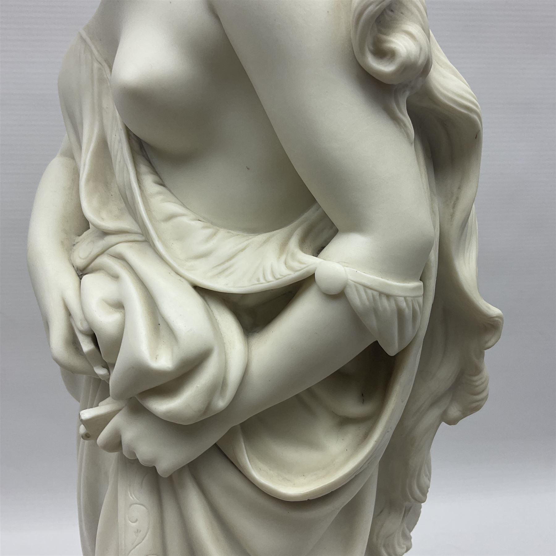 19th century Copeland Parian Ware figure, after R Monti, modelled as Lady Godiva, upon a circular titled plinth, signed and dated verso R Monti 1870, impressed to base Copyright Reserved Copeland, overall H22cm