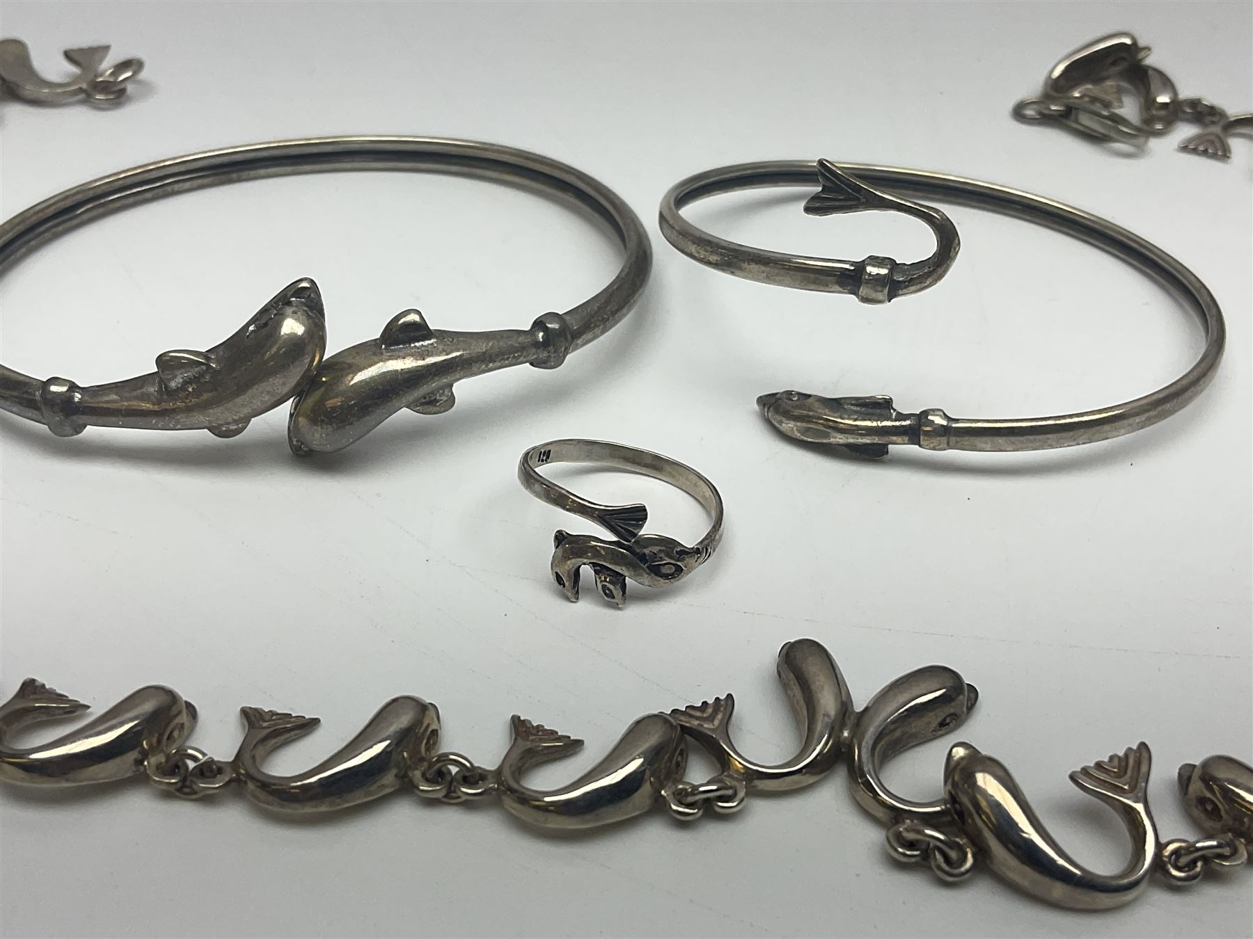 Pair of 9ct gold screw back earrings, silver dolphin jewellery, including necklace, bracelet, ring and earrings, other silver jewellery, two Sekonda wristwatches and a collection of costume jewellery 