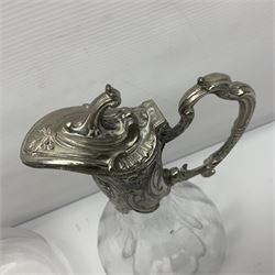 Silver plate mounted blue glass claret jug of ovid form, with C scroll handle, together with two other silver plate mounted claret jug