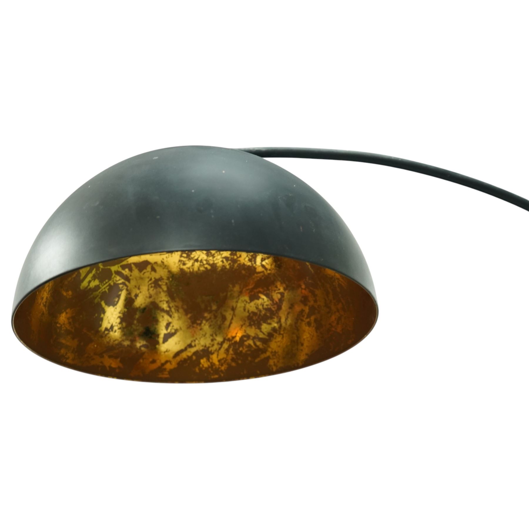 Contemporary black painted floor lamp, domed black shade with gold leaf effect interior, on a circular weighted base