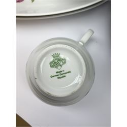 JLmenau German tea and dinner wares, comprising twelve dinner plates, seventeen side plates, twelve bowls, four large serving bowls, pair of oval serving platters, pair of smaller examples, two coffee pots, eleven teacups, twelve saucers, two milk jugs, two larger jugs, and two lidded sucriers. 