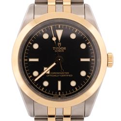 Tudor Black Bay One gentleman's stainless steel and gold automatic chronometer wristwatch, Ref. 79683, black dial with luminous hour markers, on original bracelet with fold-over clasp, boxed with guarantee dated and original receipt dated 2025