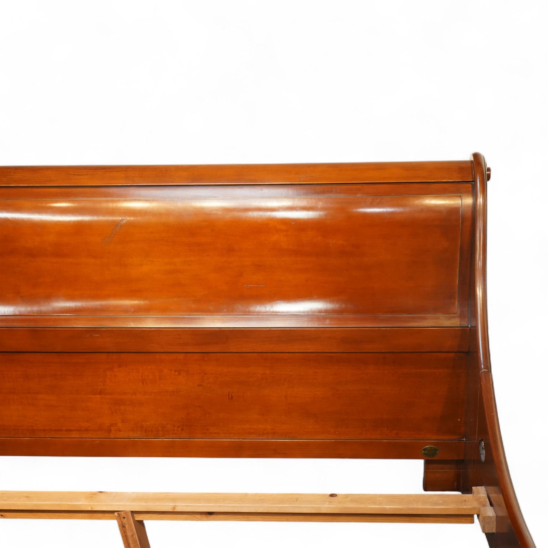 And So To Bed - Super King 'Manoir' 6' sleigh bed, the panelled headboard and footboard with pronounced scrolled ends, stepped moulded rails and shaped side panels, on block feet