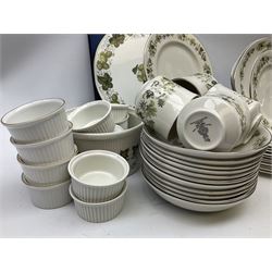 Royal Doulton tea and dinner wares decorated in the Vanity Fair pattern, to include twelve dinner plates, twelve side plates, eleven bowls, three lidded tureens, ten teacups, sauceboat on stand etc, together with boxed Royal Worcester plate, six Royal Worcester ramekins etc