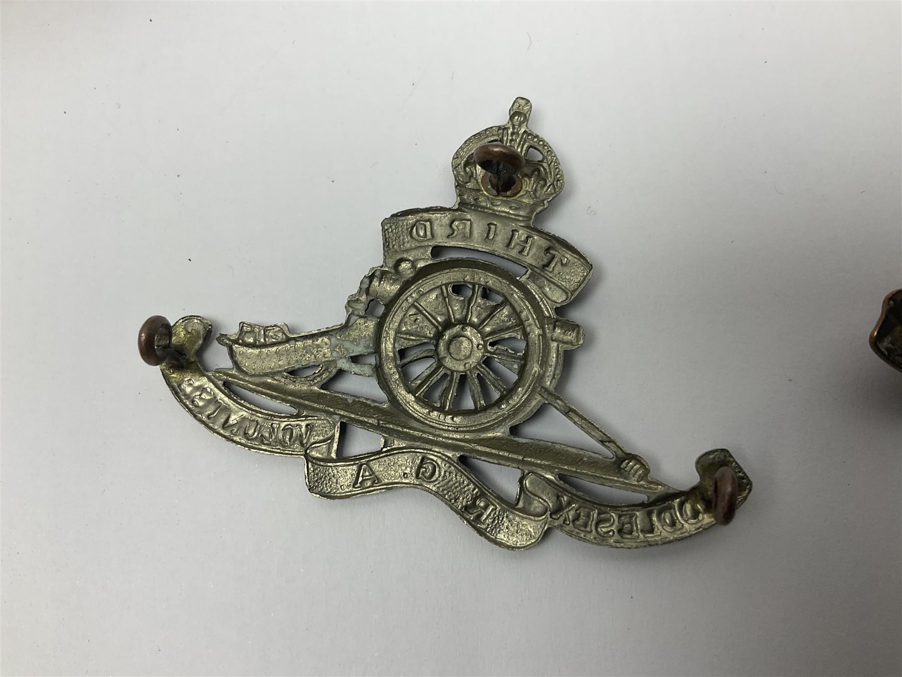 Twelve cap badges including Royal Artillery, 3rd RGA Middlesex Volunteers, Hon. Artillery Company, West Riding and Waraickshire Royal Horse Artillery, Royal Engineers and Army Service Corps (12)