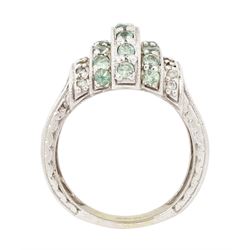 14ct white gold alexandrite and diamond stepped design ring, three rows of round cut alexandrite's, with a row of single cut diamonds either side, the shoulders with engraved foliate decoration, hallmarked