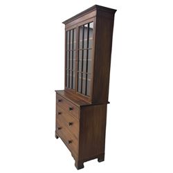 Late 19th century mahogany bookcase on chest, projecting moulded cornice over twin astragal glazed doors enclosing three shelves, base fitted with three graduated drawers, raised on shaped bracket supports
