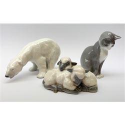 Three Royal Copenhagen animal figures, comprising Polar Bear, model no 321, two lambs, model no 2769, and kitten, model no 500. 