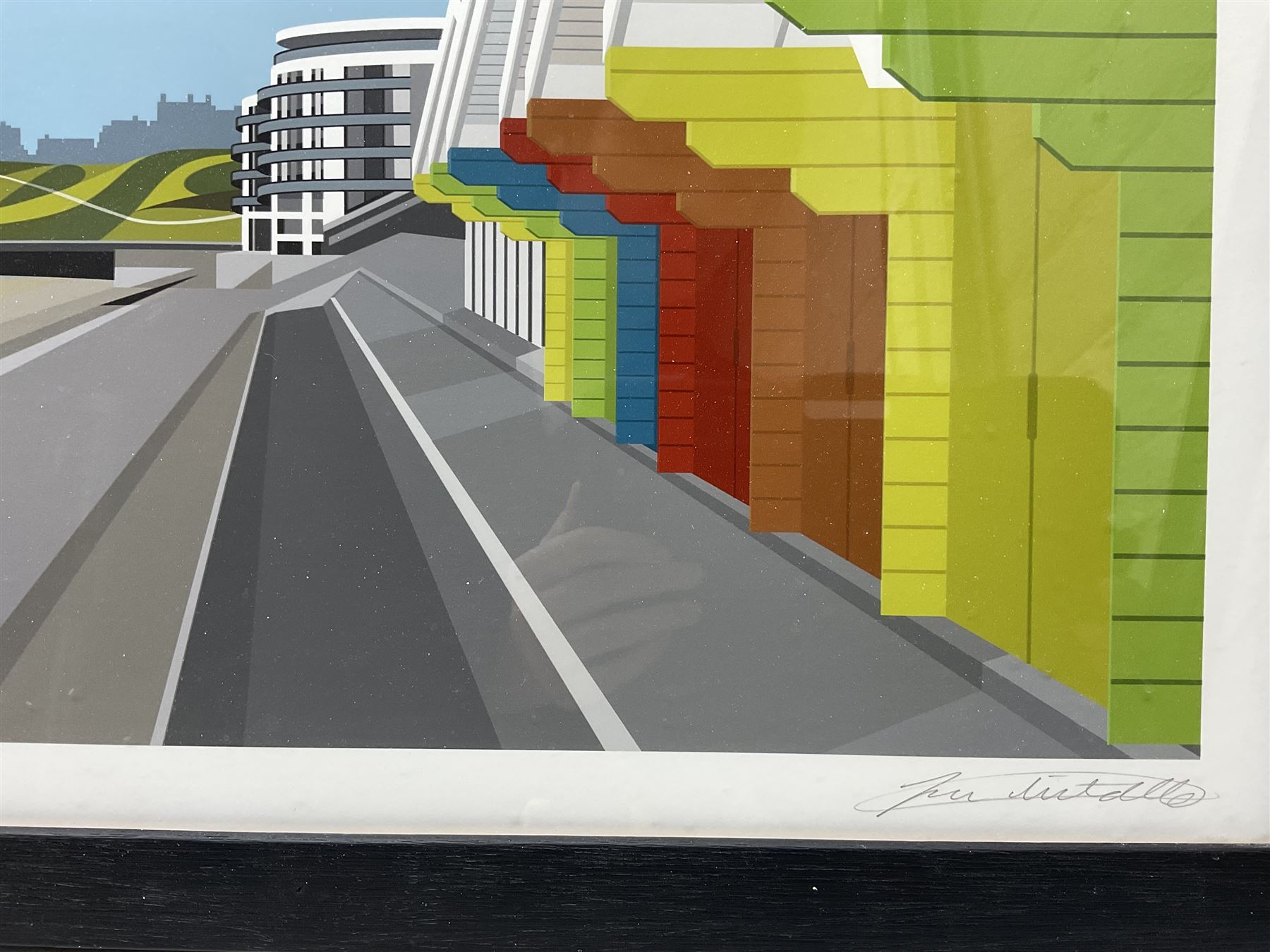 Ian Mitchell (British 20th Century): 'North Bay Beach Huts' Scarborough, limited edition digital lithograph signed titled and numbered 10/250 in pencil 29cm x 82cm 
