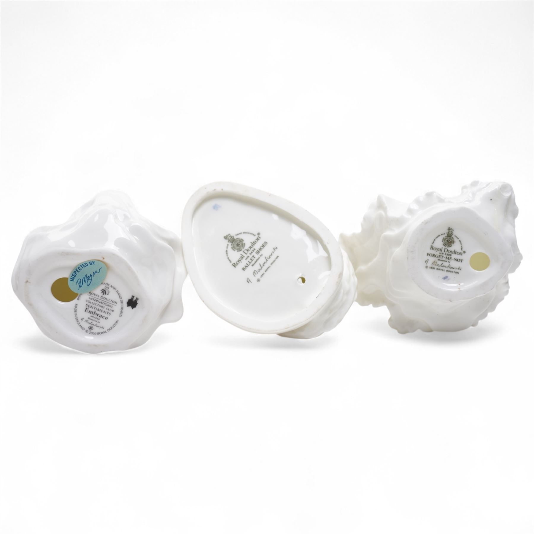 Eleven Royal Doulton figures, including Miss Demure HN1402, Ninette HN4717, Janet HN1537, Embrace HN4258 etc 