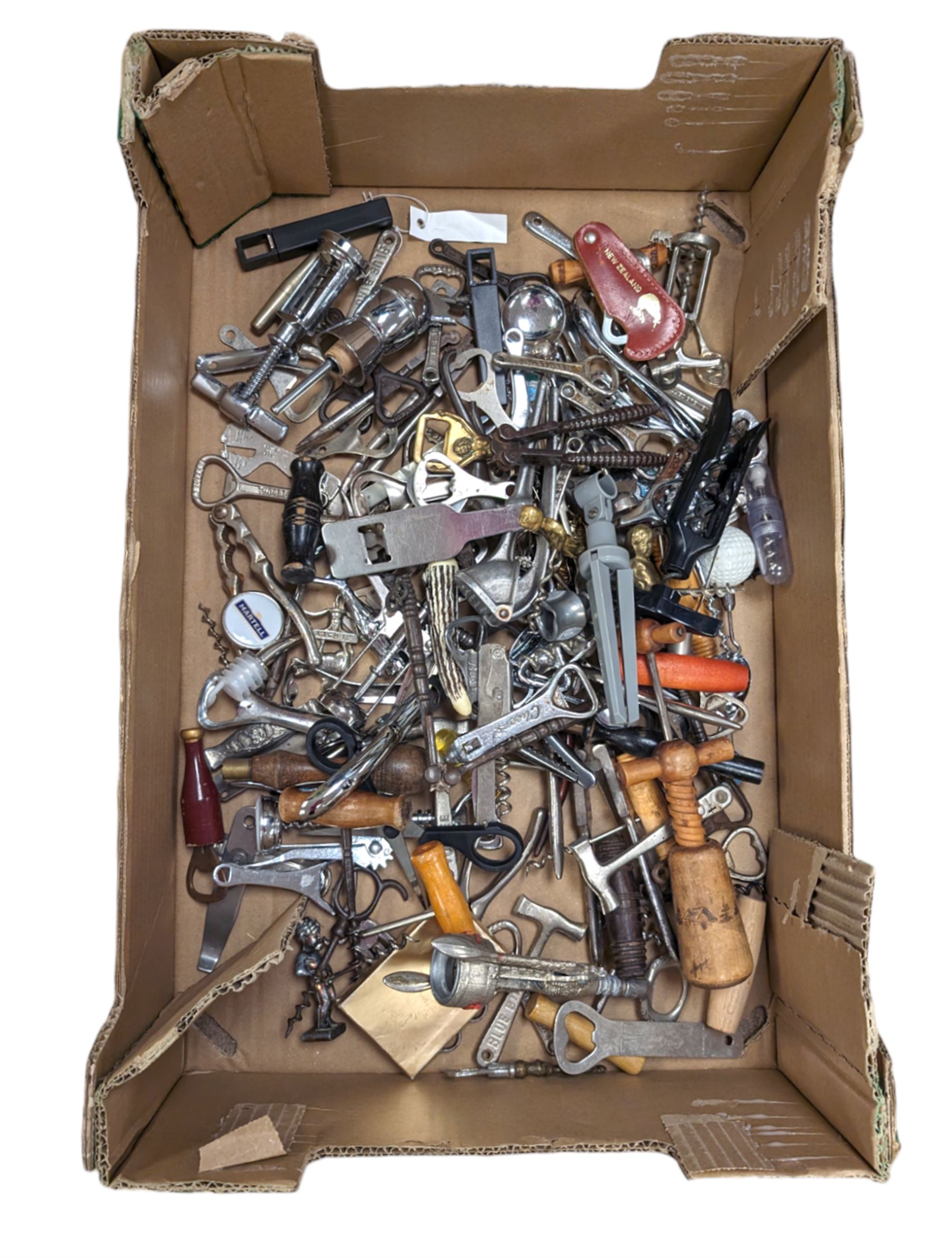 Collection of cork screws, bottle openers and bottle pourers, including turned wooden examples