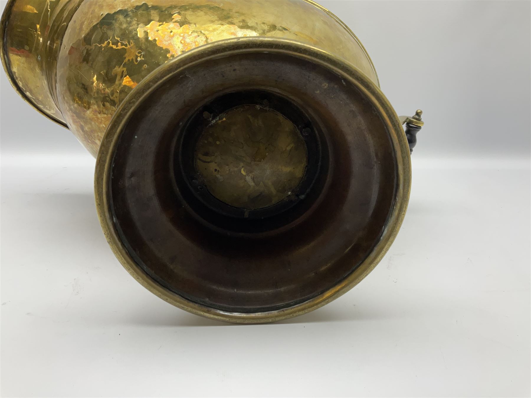 Victorian brass coal scuttle, of helmet form with turned ebonised handles, H48cm