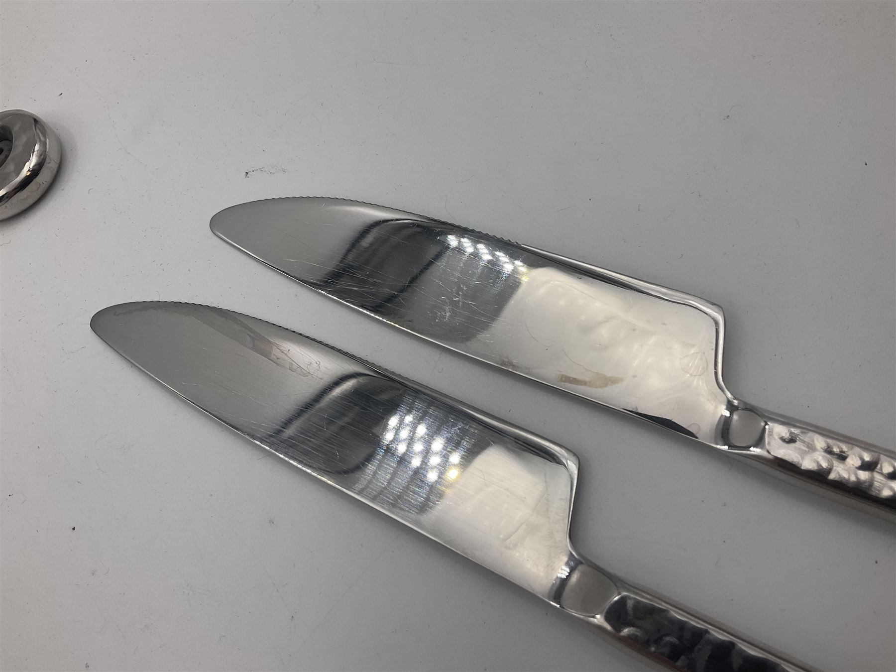 Artisan 24 piece stainless steel cutlery set in the Hammered Shell pattern