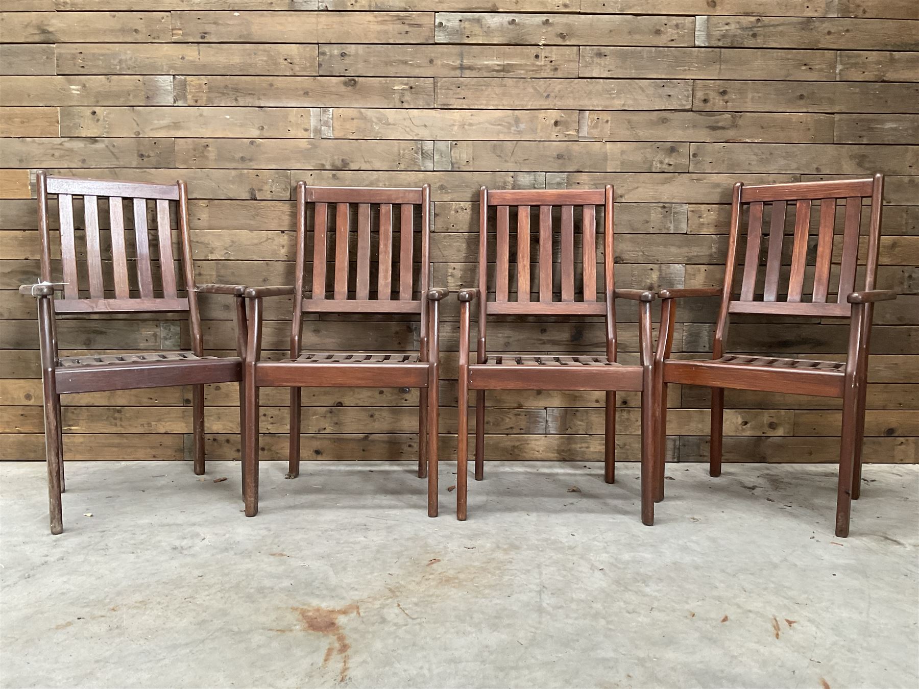 Set of eight hardwood garden armchairs