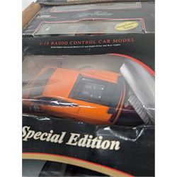 Fourteen 1:18 and 1:24 scale diecast model vehicles, including Classico Ferrari 1972 312, DX RC Lamborghini Gallardo, Maisto Silver Edition Porsche Boxter, , Bburago Williams Fw14, Bburago Ferrari 641/2, etc all boxed