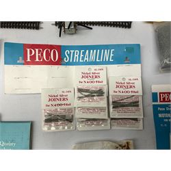 Peco 'N' gauge - quantity of track including motorised points, straights, curves etc; and quantity of packeted accessories including Motor(Switch Machines), nickel silver joiners etc
