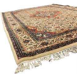 Indo-Persian Baktmar rug, decorated with central floral medallion surrounded by Herati motifs, the main border with repeating pattern decorated with stylised plant motifs, within guard stripes 