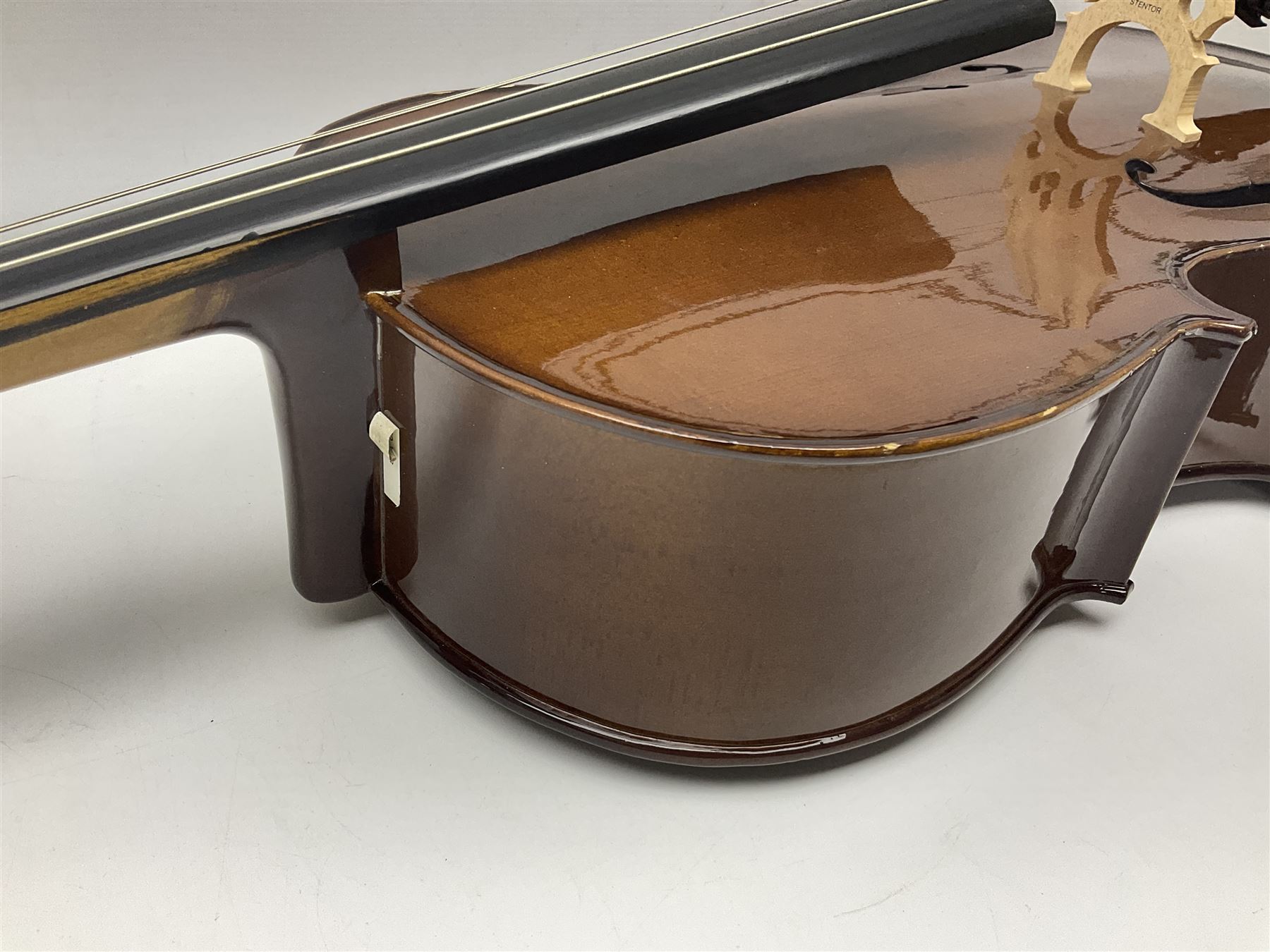 Stentor Student I quarter-size cello with 59.5cm two-piece maple back and ribs and spruce top; bears maker's label with serial no.M072648 L95.5cm overall; in Stentor soft carrying case with bow