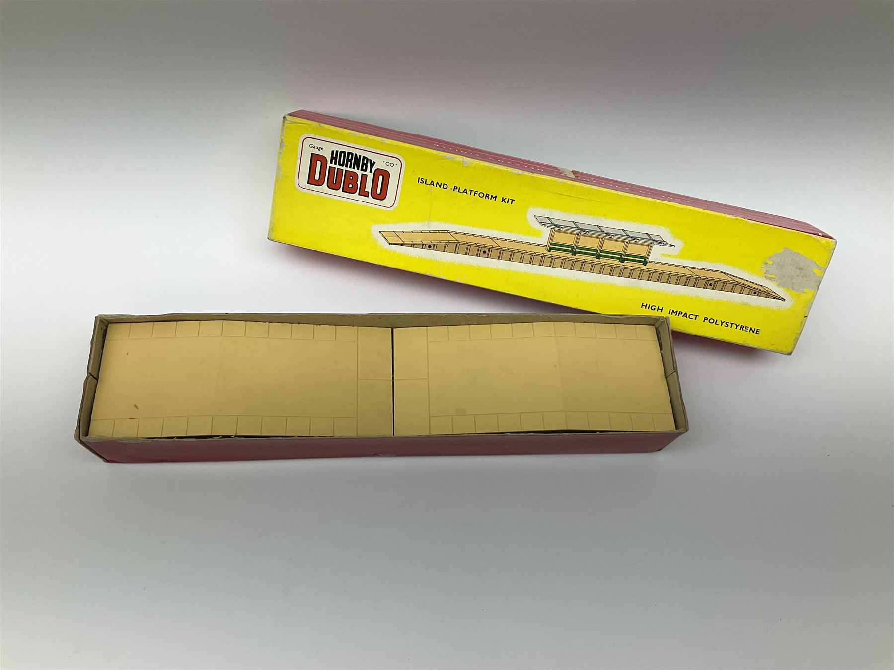 Hornby Dublo - 5006 Engine Shed Extension Kit; 5085 Suburban Station Kit with instructions; and 5030 Island Platform Kit; all in pictorial boxes; and Goods Depot Moulded Kit in box base only (4)