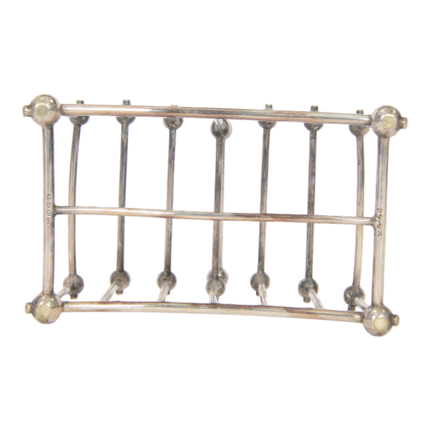 Christopher Dresser (1834-1904) for Hukin & Heath, silver plated six division bridge toast rack, circa 1880, Stamped makers marks and model number 2554, H12cm