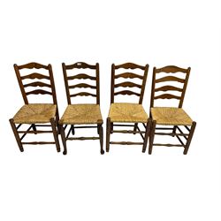 Harlequin set of nine country elm and beech chairs - pair 19th century spindle back carver armchairs with wingbacks, and a mixed set of seven ladderback side chairs, all with rush seats