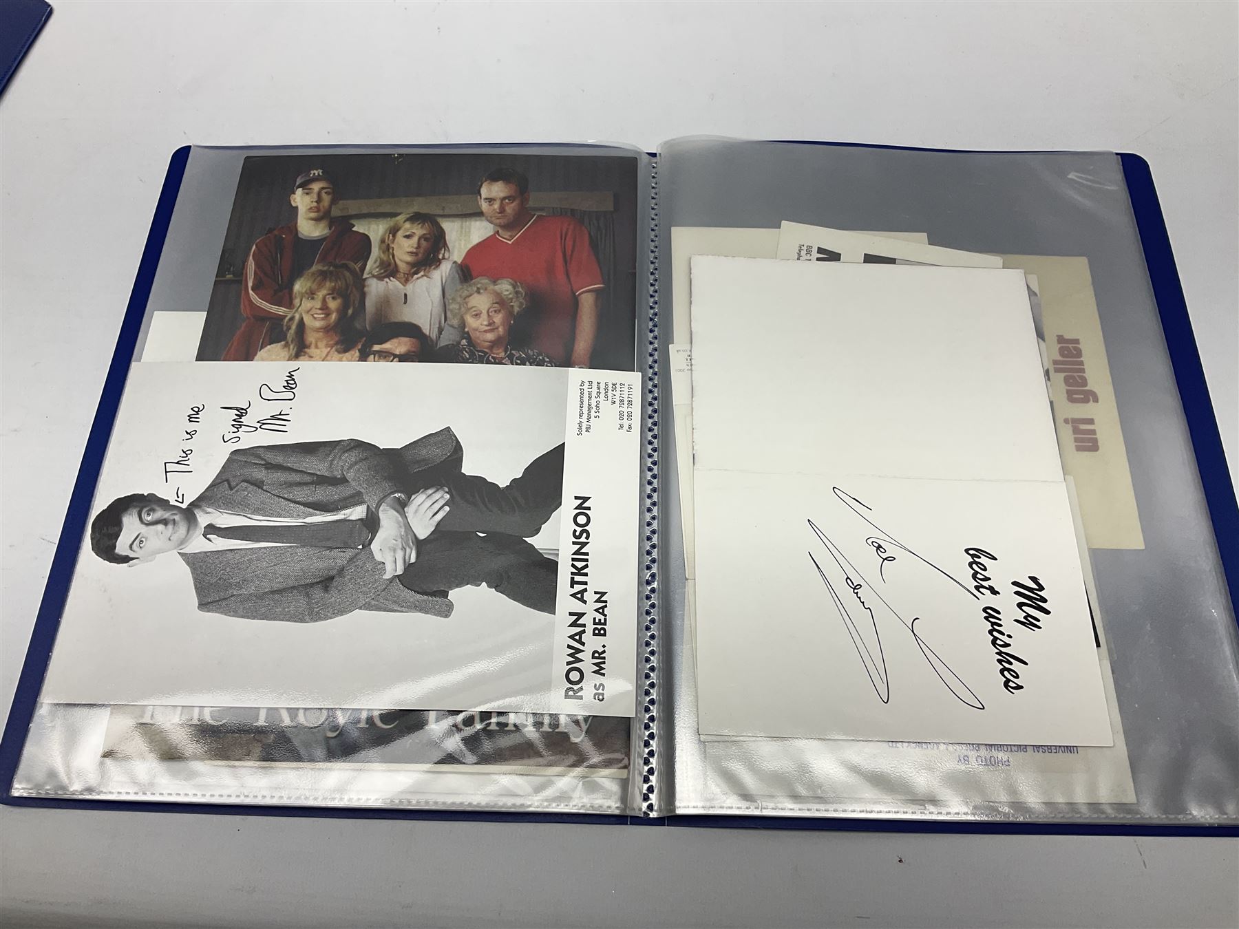 Two folders of over fifty photographs, cards, compliment slips etc of actors, actresses, celebrities, politicians, sports personalities etc, all bearing signatures, including David Frost, Lloyd Grosman, John Suchet, Julia Somerville and othe GMTV presenters, Carol Vorderman, Jackie Collins, Rolf Harris, Timothy Dalton, Pete Postlethwaite, Magnus magnusson, John Major, Kate Moss, Uri Geller, David Beckham, Peter Alliss, Sharon Davies, Kevin Keegan etc