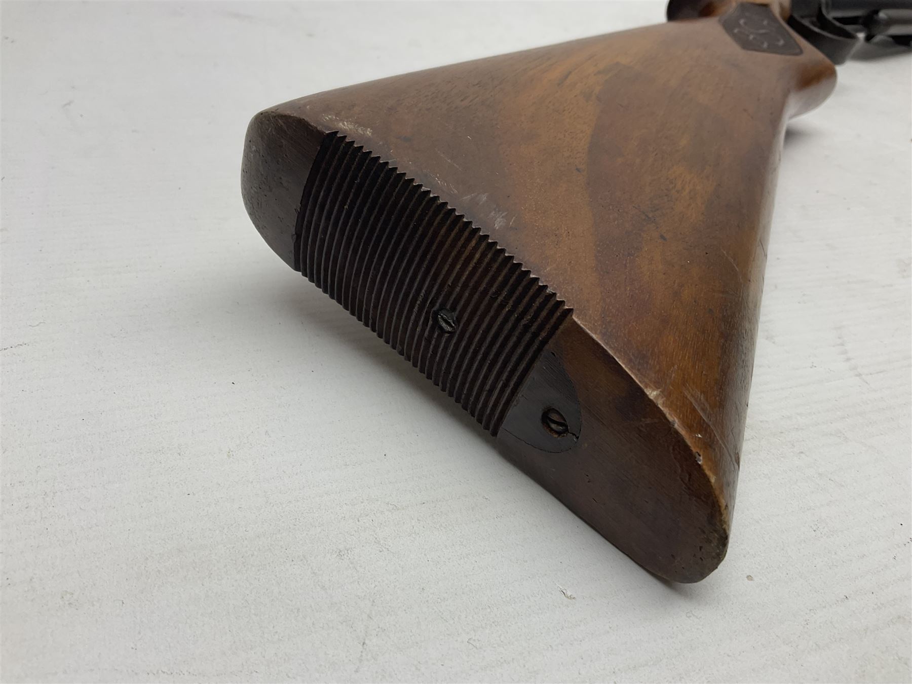 Early 20th century BSA Standard .177 Cal. Air Rifle (No.1), early A prefix number A67, with blued finish, top-loading, push-button underlever action, walnut semi-pistol grip stock with chequered BSA logo L101cm overall; with contemporary canvas case; NB: AGE RESTRICTIONS APPLY TO THE PURCHASE OF AIR WEAPONS.