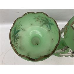 Pair of bohemian green glass lustres, each with a shaped bowl painted with stylised floral and foliate decoration supporting cut clear glass lustre drops upon central column, H34cm