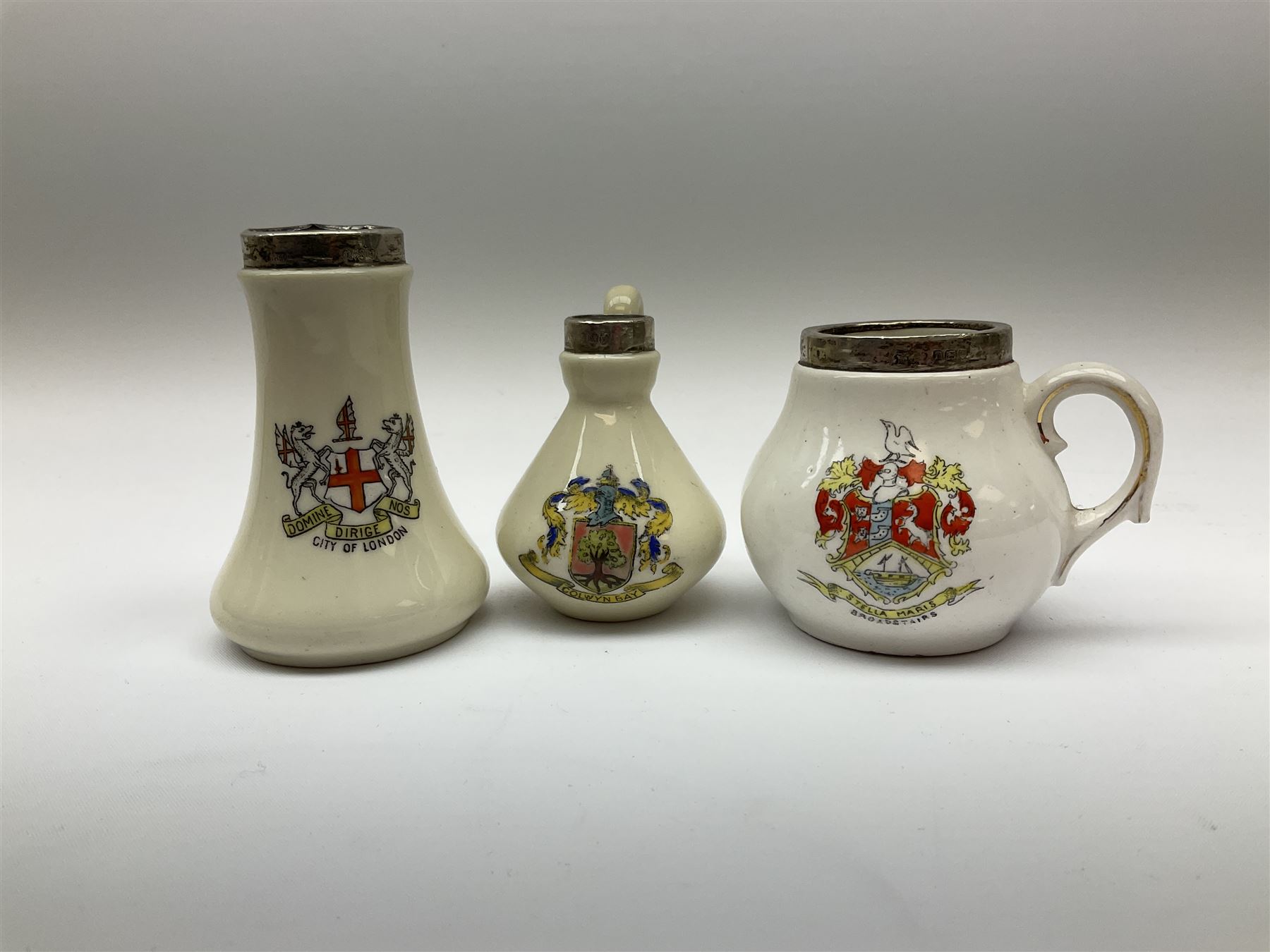 Group of silver mounted glass scent bottles and crested ware, together with a Brierglass lead crystal box with a glass and silver, lid, etc all silver with various hallmarks. 