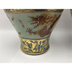 Pair of early 20th century Chinese vases decorated with dragons chasing a flaming pearl, with a gilt border of butterflies and floral sprigs, with Elephant head handles, H44cm 