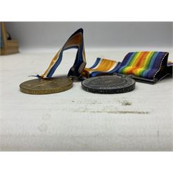Pair of WWI medals, comprising British War medal and Victory medal, both with ribbons