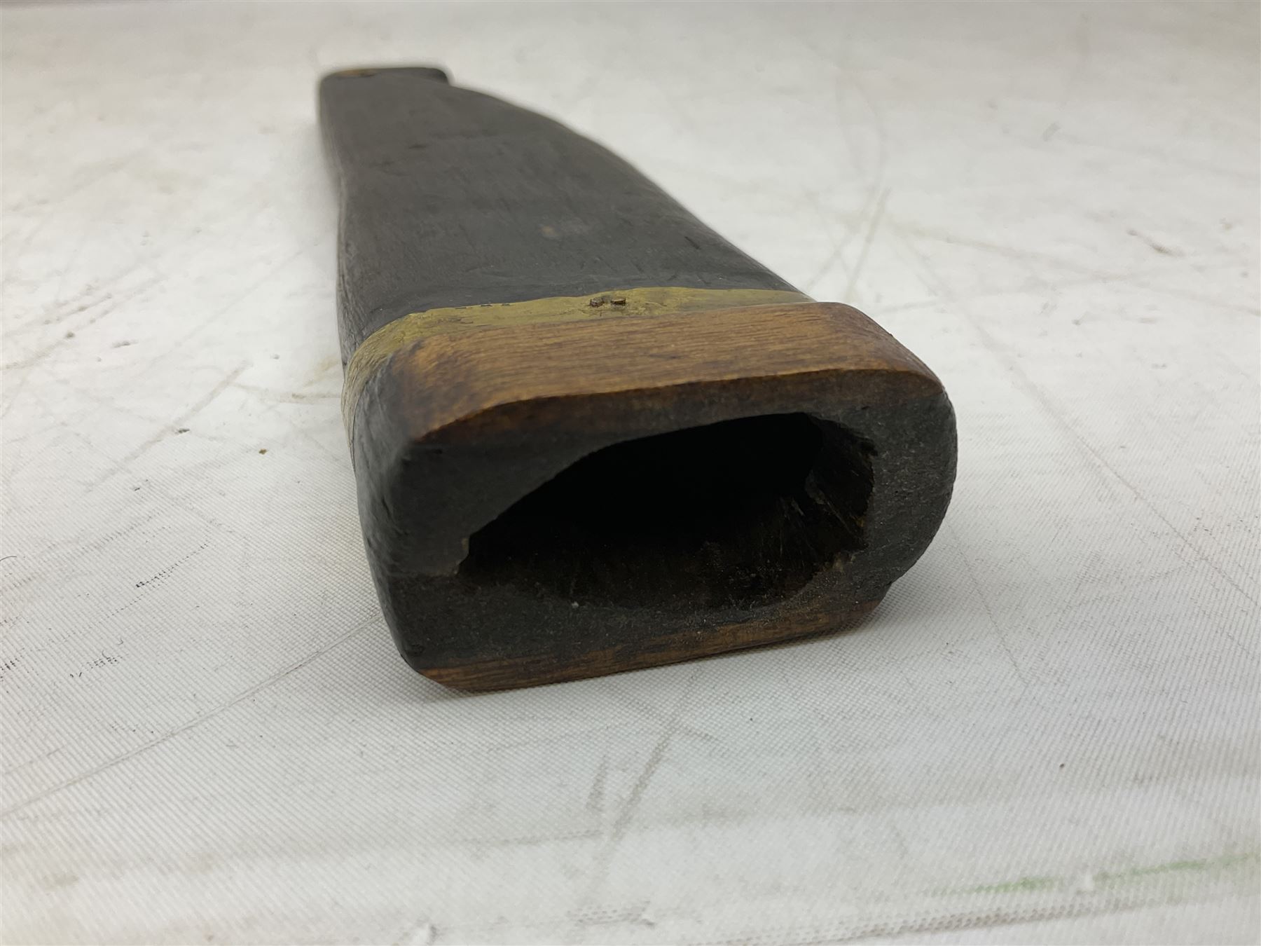 19th century Singhalese knife pia kaetta, the 20cm steel blade inset with yellow and white metal, with metal mounted carved pistol grip, in plain wooden scabbard L33cm overall