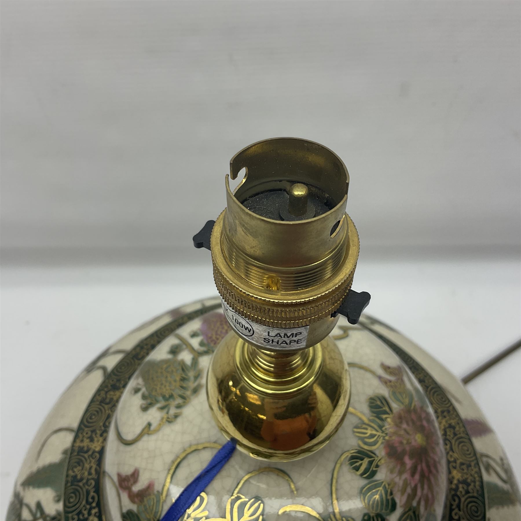 Table lamp of squat baluster form, decorated with Mandarin ducks and floral  landscape, upon a circular wooden base H42cm