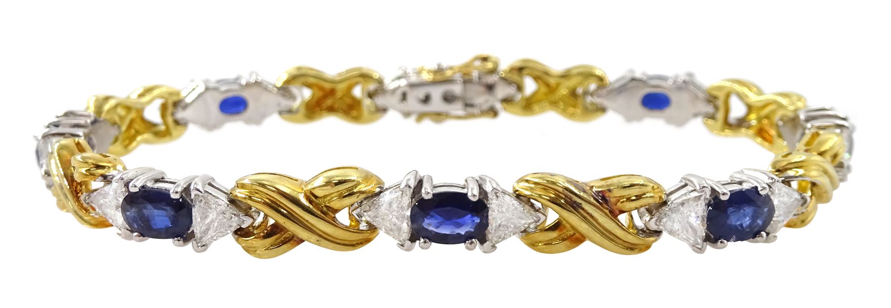 18ct gold eight oval cut sapphire and sixteen trillion cut diamond bracelet, total diamond weight approx 3.25 carat, total sapphire weight approx 4.50 carat