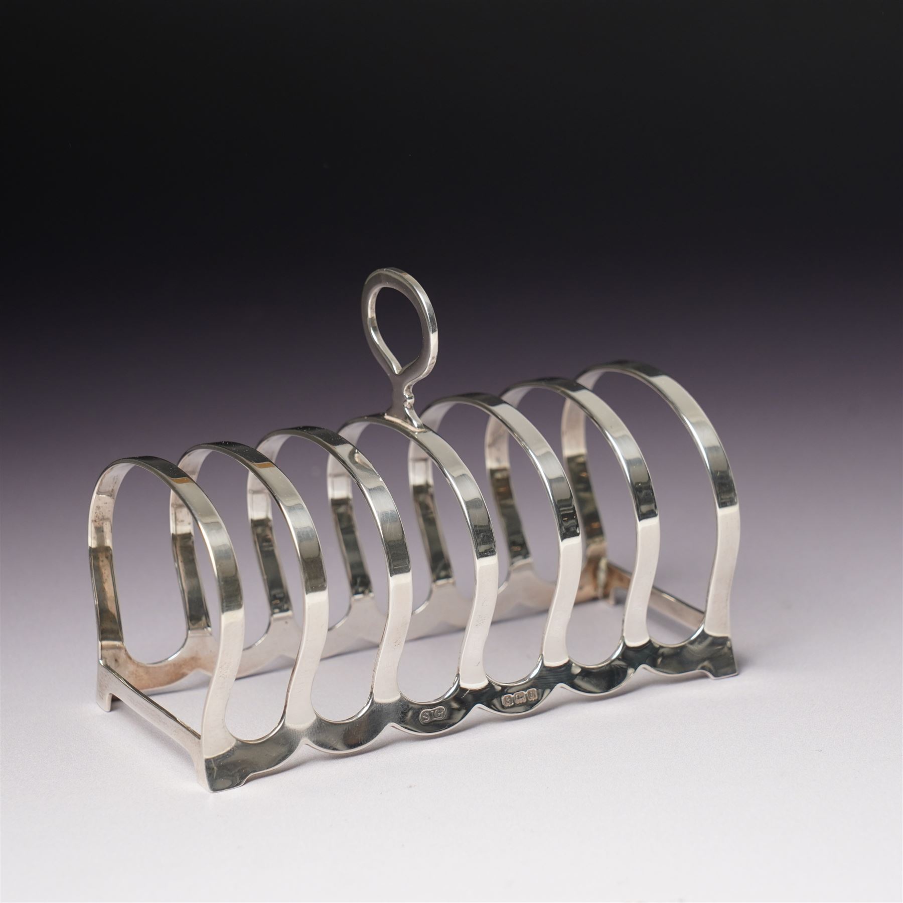 Silver six division toast rack with loop handle Birmingham 1933 Maker William Suckling Ltd
