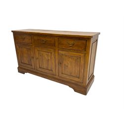 Willis & Gambier - oak sideboard, three drawers over three panelled cupboards, on bracket feet 