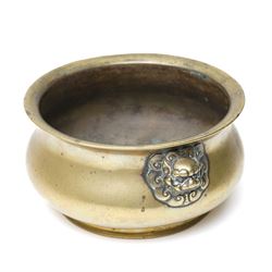 Chinese Ming dynasty gilt bronze censer, of circular bellied form with temple lion mask handles, upon a circular foot, six character Xuande mark to base, D15.5cm