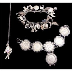 Silver jewellery including charm bracelet with twenty six charms including guitar, taxi, rickshaw and elephant etc, coin bracelet mounted with six pre 1947 shillings, and abelone fish design pendant necklace 