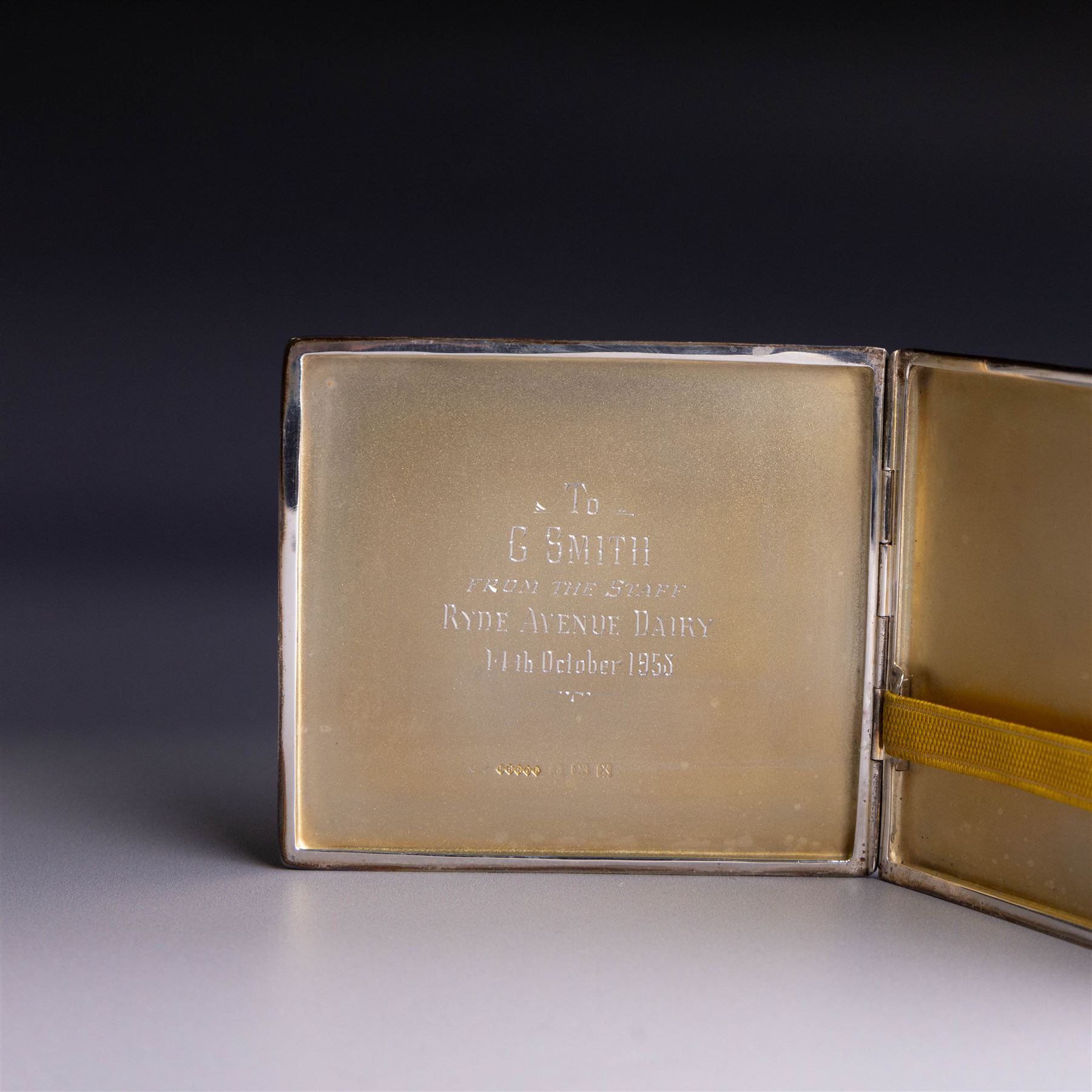 Mid 20th century silver cigarette case, with engine turned decoration and engraved initials to cover, with presentation engraving to the interior, hallmarked Harman Brothers, Birmingham 1947, H8.5cm, W9.5cm