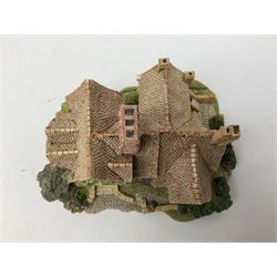 Three Lilliput lanes, comprising Oakwood Smithy, Anne of Cleves and Bluebell Farm, all with deeds and original boxes 