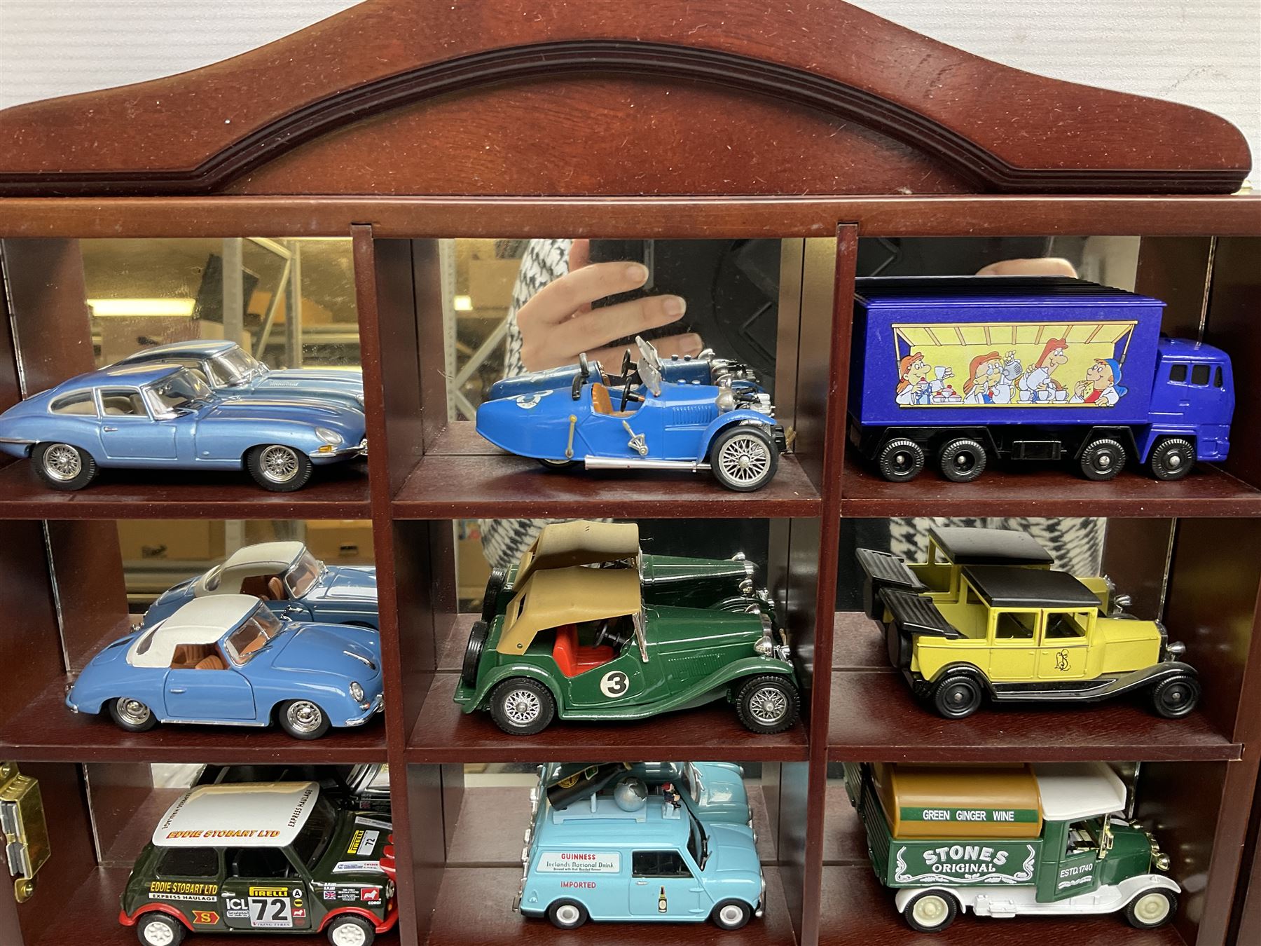 Collection of die-cast vehicles to include Corgi, Dinky, Lledo and Days Gone, housed in six wood display units