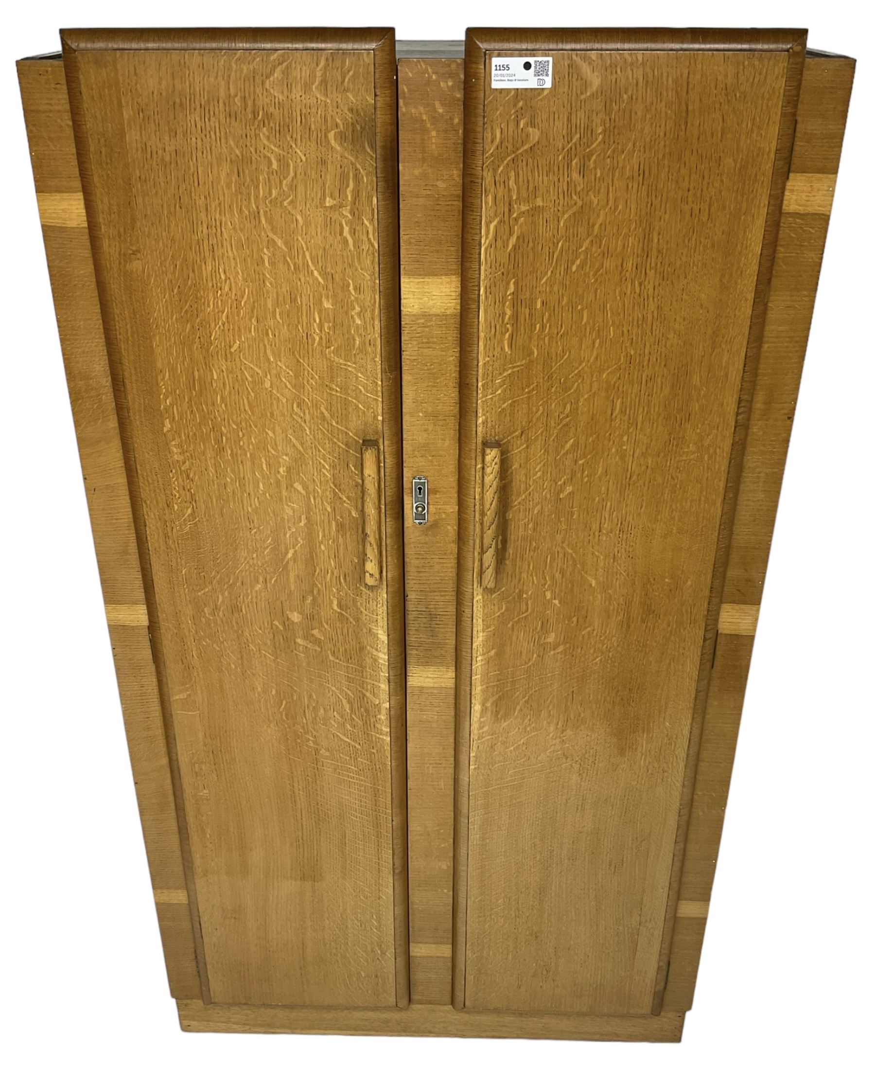 Early 20th century Art Deco period oak Gentleman's wardrobe, the interior fitted with shelves, hanging rails and two long drawers