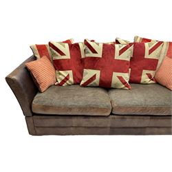 Large Knole design three-seat sofa upholstered in brown leather with scatter cushions upholstered in contrasting striped and Union Jack patterned fabric, on block feet (W210cm, H100cm, D102cm); together with matching rectangular footstool (135cm x 75cm, H45cm)