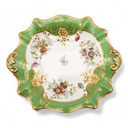 Large early 19th century Derby porcelain dessert basket, of rectangular twin-handled form, with cobalt blue and gilt decoration, painted marks beneath, L29cm together with a 19th century porcelain dessert service, decorated with floral sprays within a green and gilt border, comprising eight plates and three serving dishes, pattern no. 701/1