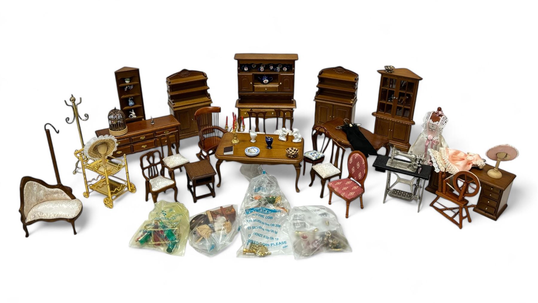 1:12 scale dolls house hallway and dining room furniture, including hat stand, mannequin, dressers and cabinets with ceramic ornaments, rocking chair, dining table, side board, dresser, drinks trolley, sewing machine, dining accessories and food, etc
