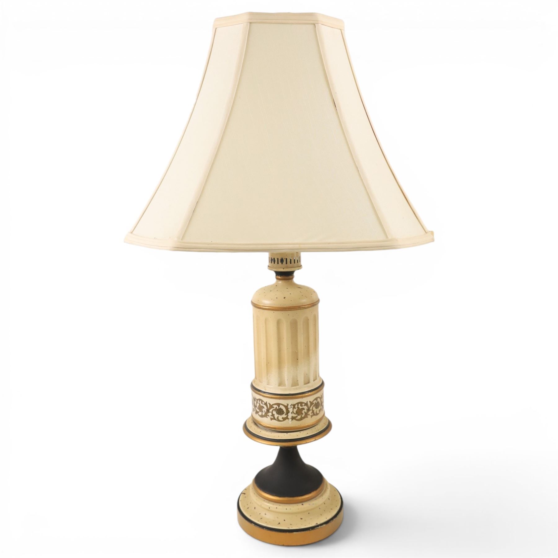 Pair of table lamps, the central column with gilt and and black bands and a foliate boarder, with cream shades, H58cm without shades 